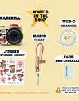Digital Jessie mini camera with accessories including a sticker sheet, hand strap, USB-C charger, and 16GB memory card.