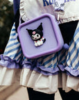 A purple silicone bag featuring a 3D Kuromi character, worn over a striped dress.