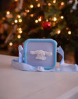 A light blue silicone Cinnamoroll bag with a white Cinnamoroll character on the front.