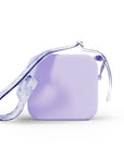 Purple silicone bag with a unicorn print strap.