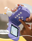 Close-up of a child using the Kidamento Model V unicorn kids digital camera. Shows flip screen, menu buttons, and fun digital filters on screen—ideal creative camera for ages 3 to 9.