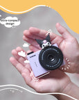Kuromi kids digital camera Model A by Kidamento shown in a child’s hands – ultra-compact design.