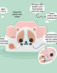 Front view of the kiimento Meowie the Cat digital camera with attached lens cap, pink silicone shell, durable ABS plastic, 32GB memory card, and colorful photo and video features for kids ages 5 to 8.