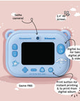 Back view of the Kidamento Model P Cinnamoroll kids’ digital camera showing labeled features including the selfie camera, 2.4-inch IPS screen, digital photo/video button, and print button for instant prints or printing from the digital album. Background is pink with playful cloud illustrations. And it's game free.
