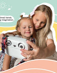 Two girls taking a selfie with kiimento Model P Panda kids camera, showing playful bonding moment with colorful background.