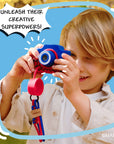 A child holds a blue and red Spider-Man digital camera.