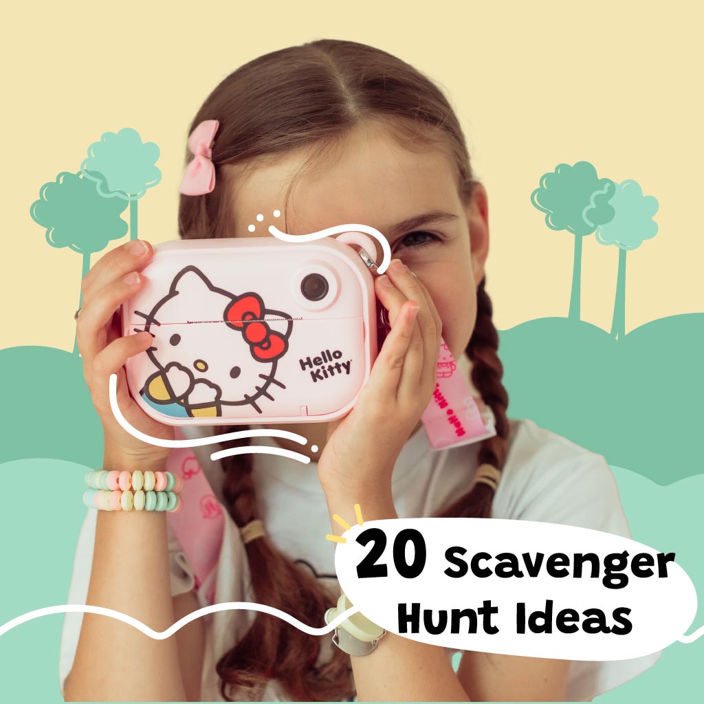 Smiling child holding a Hello Kitty Kidamento instant camera for a fun photo scavenger hunt