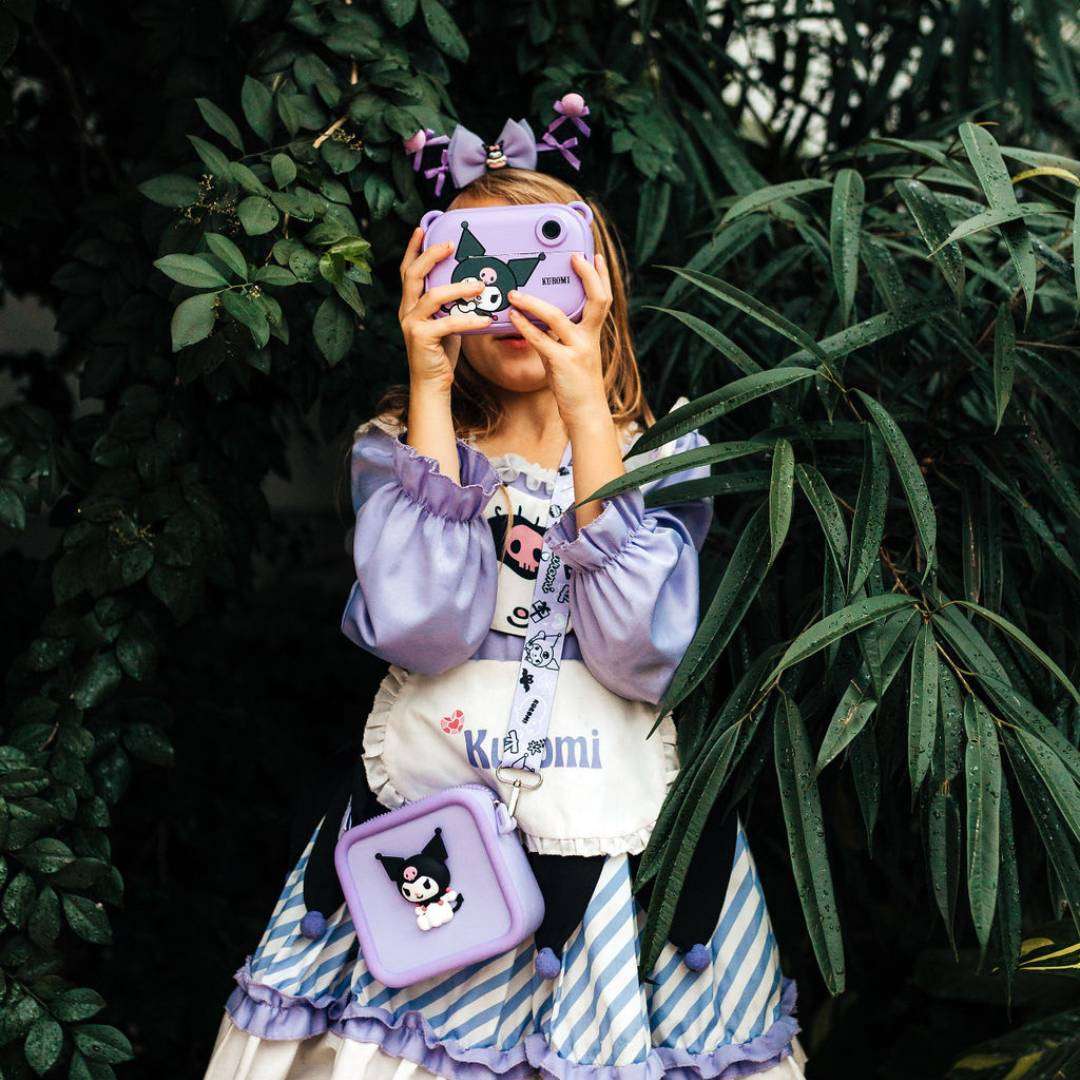 Purple silicone Kuromi bag with a 3D Kuromi character, worn by a child in a Kuromi outfit.