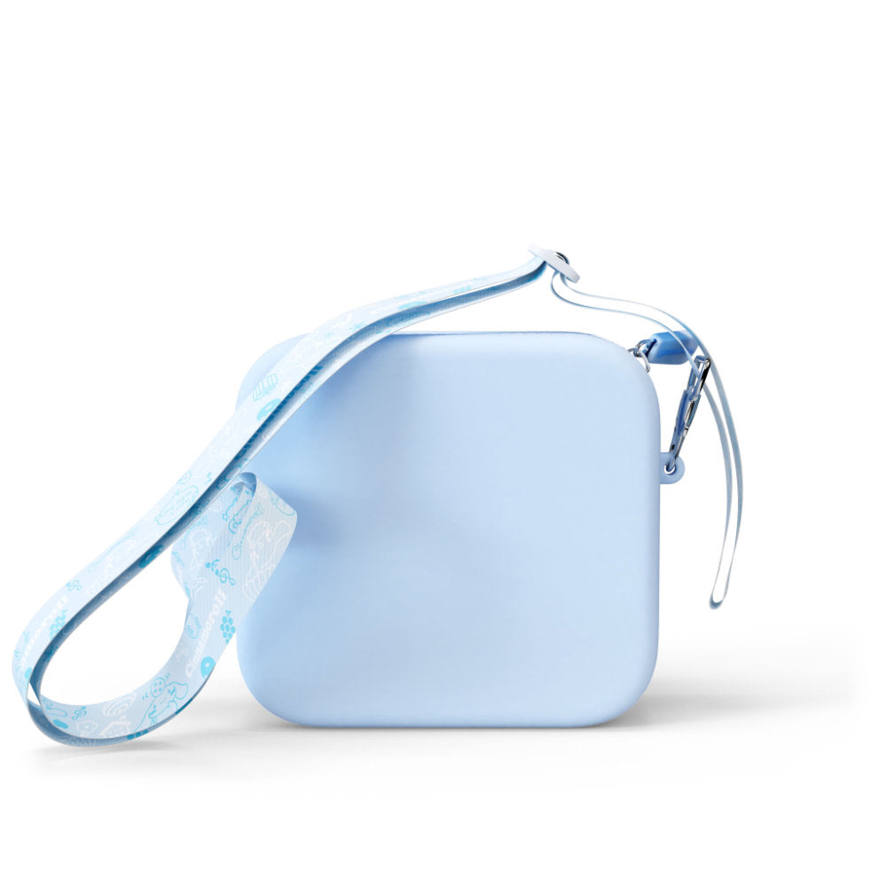 A light blue silicone bag with a patterned strap is shown on a white background.