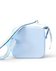 A light blue silicone bag with a patterned strap is shown on a white background.