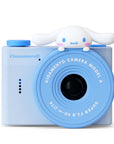 Front view of Kidamento Model A Cinnamoroll kids’ digital camera in pastel blue, featuring a cute 3D Cinnamoroll character on top of the lens