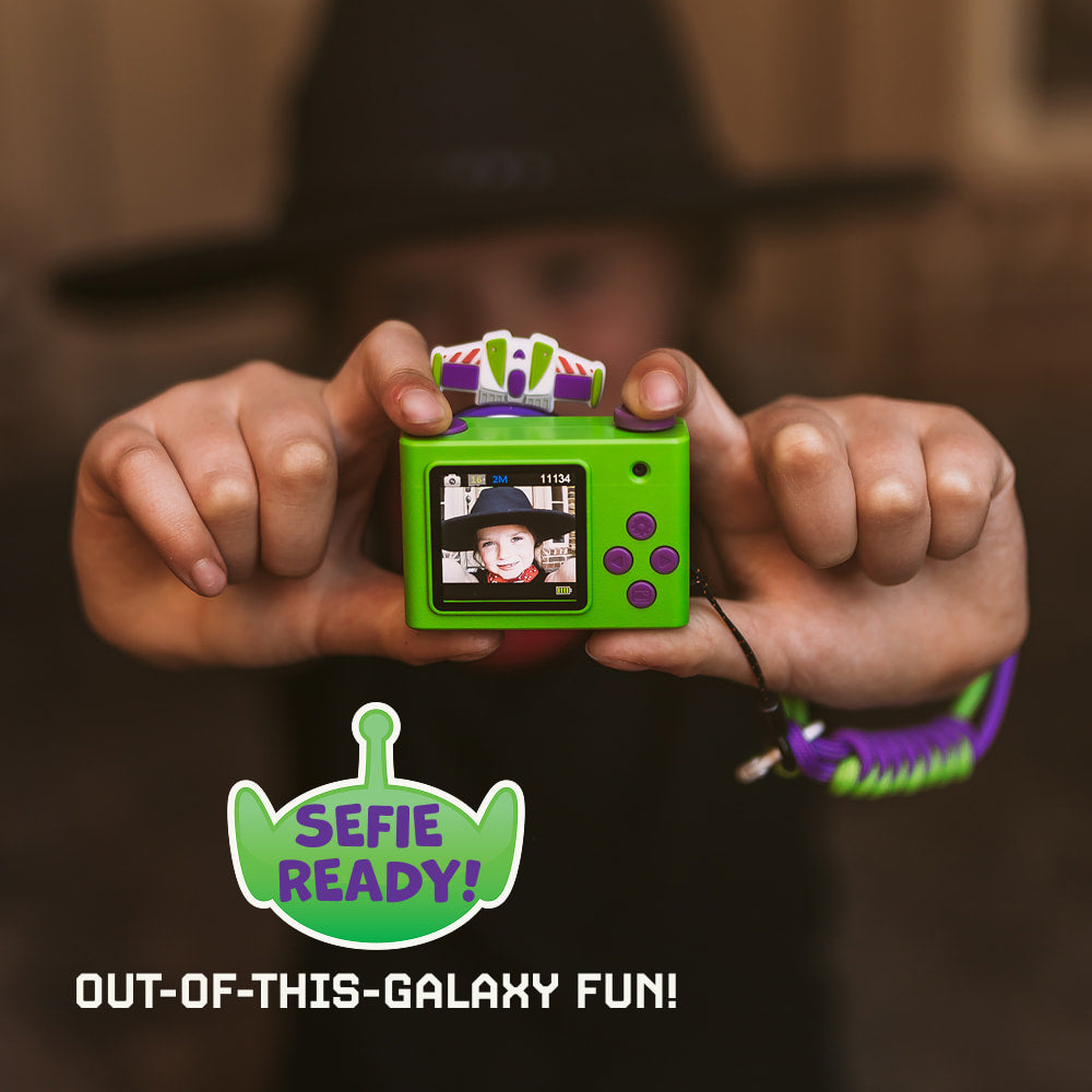Rear view of the digital Buzz Lightyear mini camera showing the digital LCD screen, a purple circular directional pad, green buttons for navigation, themed filters and the selfie of a happy kid. 