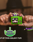 Rear view of the digital Buzz Lightyear mini camera showing the digital LCD screen, a purple circular directional pad, green buttons for navigation, themed filters and the selfie of a happy kid. 
