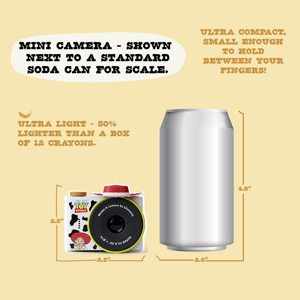 Digital Jessie mini camera mini camera with iconic wings shown next to a soda can for size comparison.