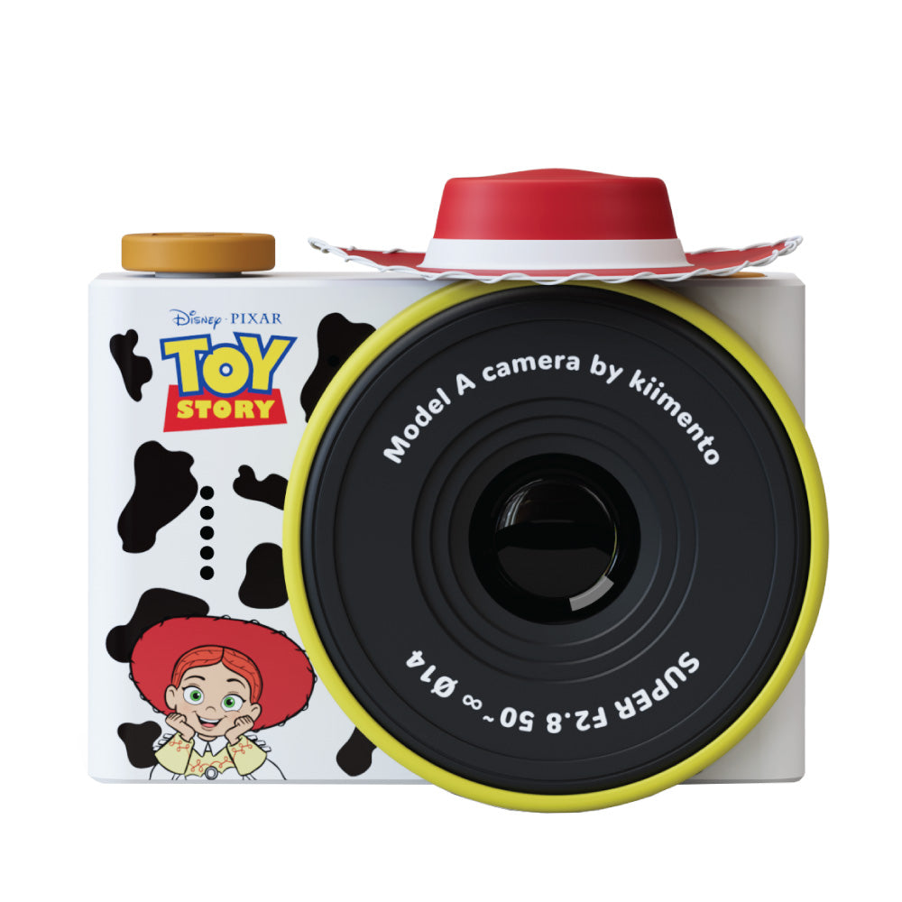 Front view of the Disney Jessie Model A mini camera featuring a cowhide print body, a red lens barrel, and Toy Story branding.