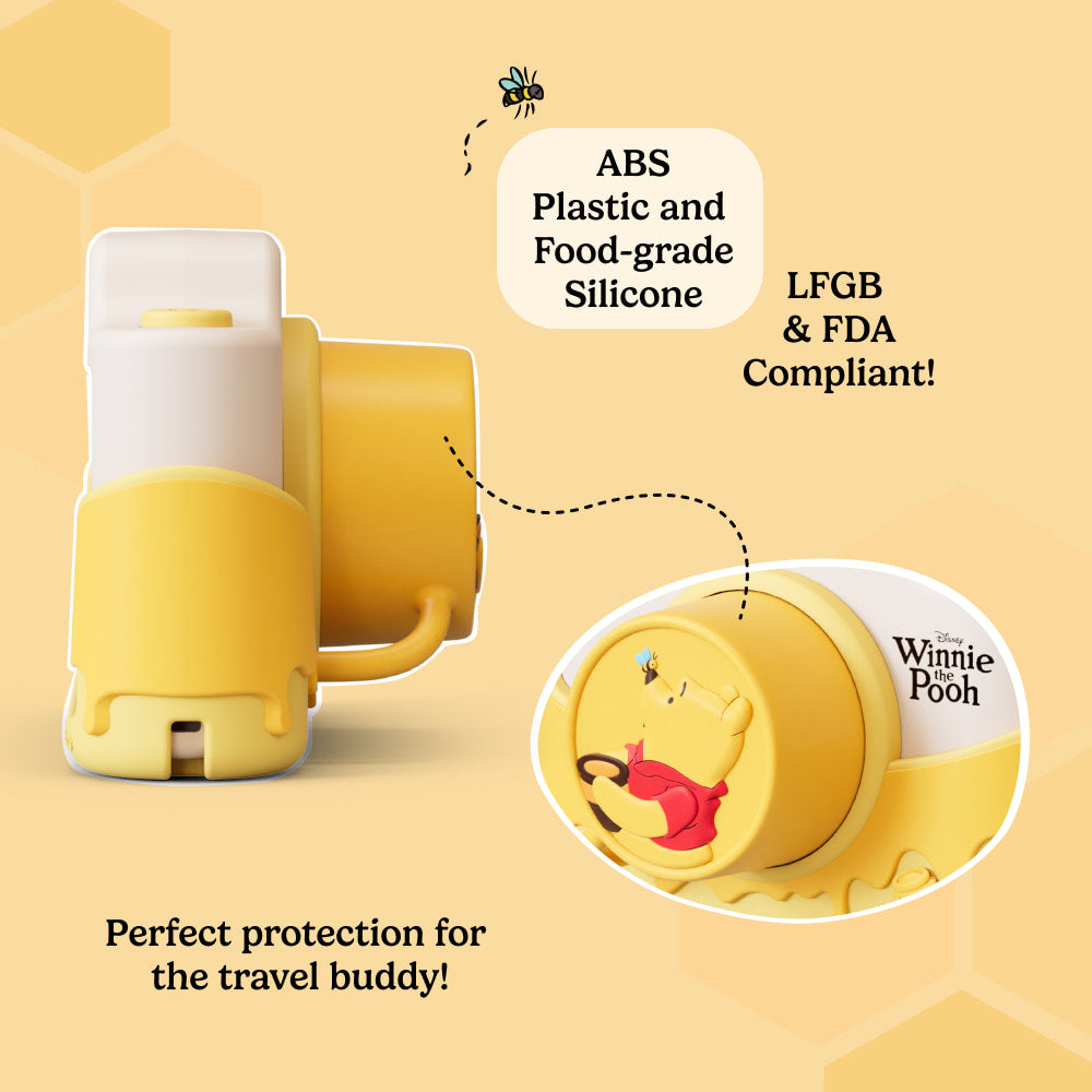 Side and lens view of the Winnie the Pooh kids camera made from ABS plastic and food-grade silicone, LFGB and FDA compliant, designed for travel protection.