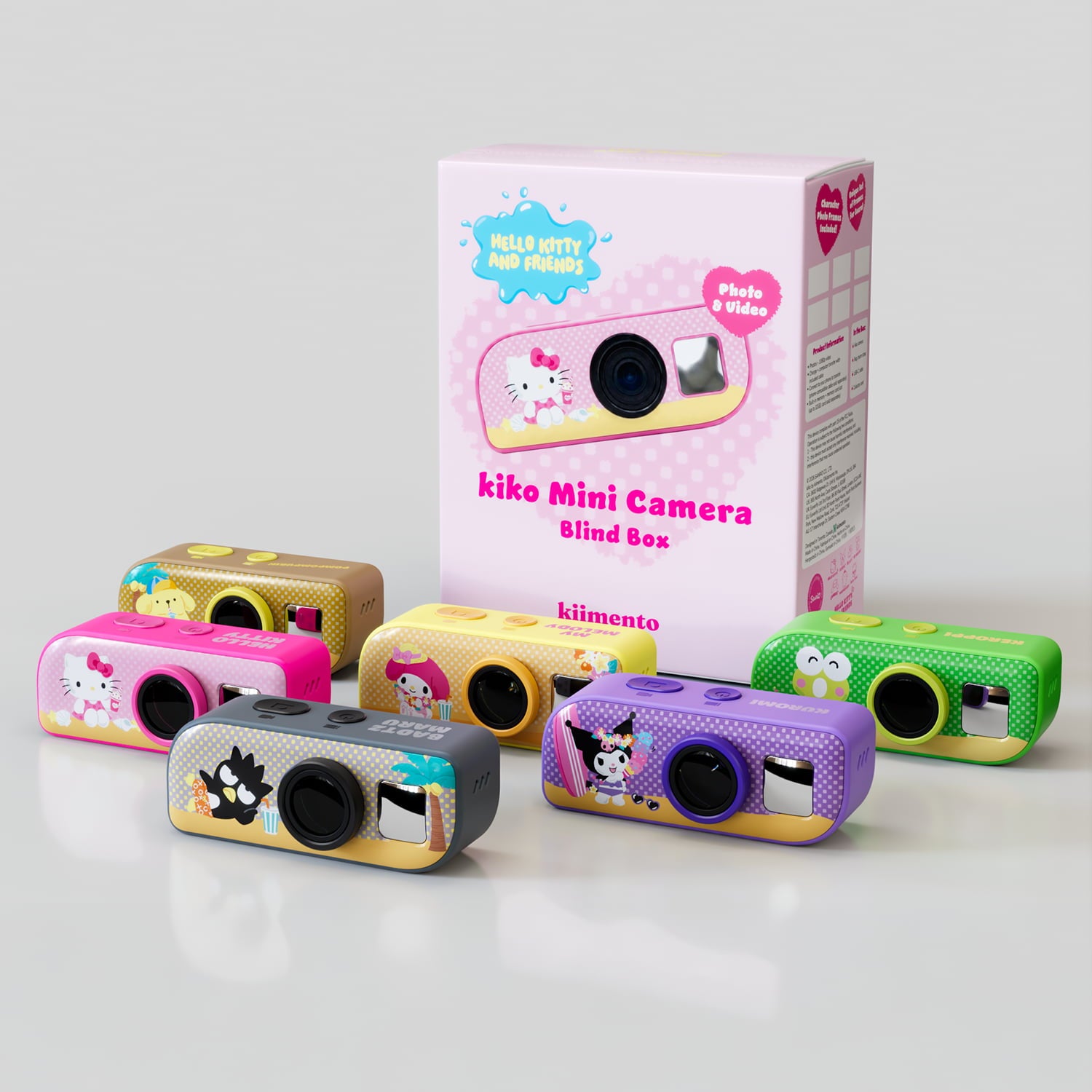 Kiko Mini Camera Hello Kitty and Friends Blind Box master/case packaging, angled three-quarter view, showing "kiko Mini Camera," "Blind Box," "6+1 Styles Total," Hello Kitty and Friends branding, and a printed style checklist (Hello Kitty, Kuromi, My Melody, Pompompurin, Badtz-Maru, Keroppi) plus a partial secret-style teaser on the side panel.
