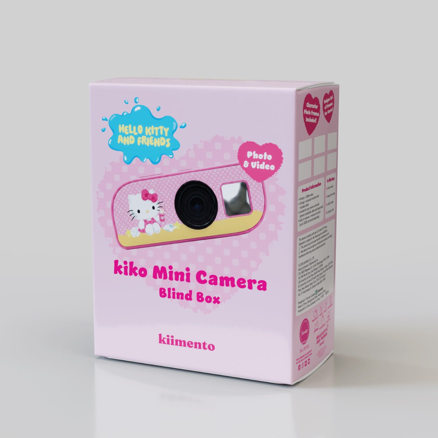 Kiko Mini Camera Hello Kitty and Friends Blind Box packaging, front-angled view, showing the Hello Kitty design through the window, "kiko Mini Camera," "Blind Box," and "Photo & Video" callouts, kiimento branding on a pink illustrated box.
