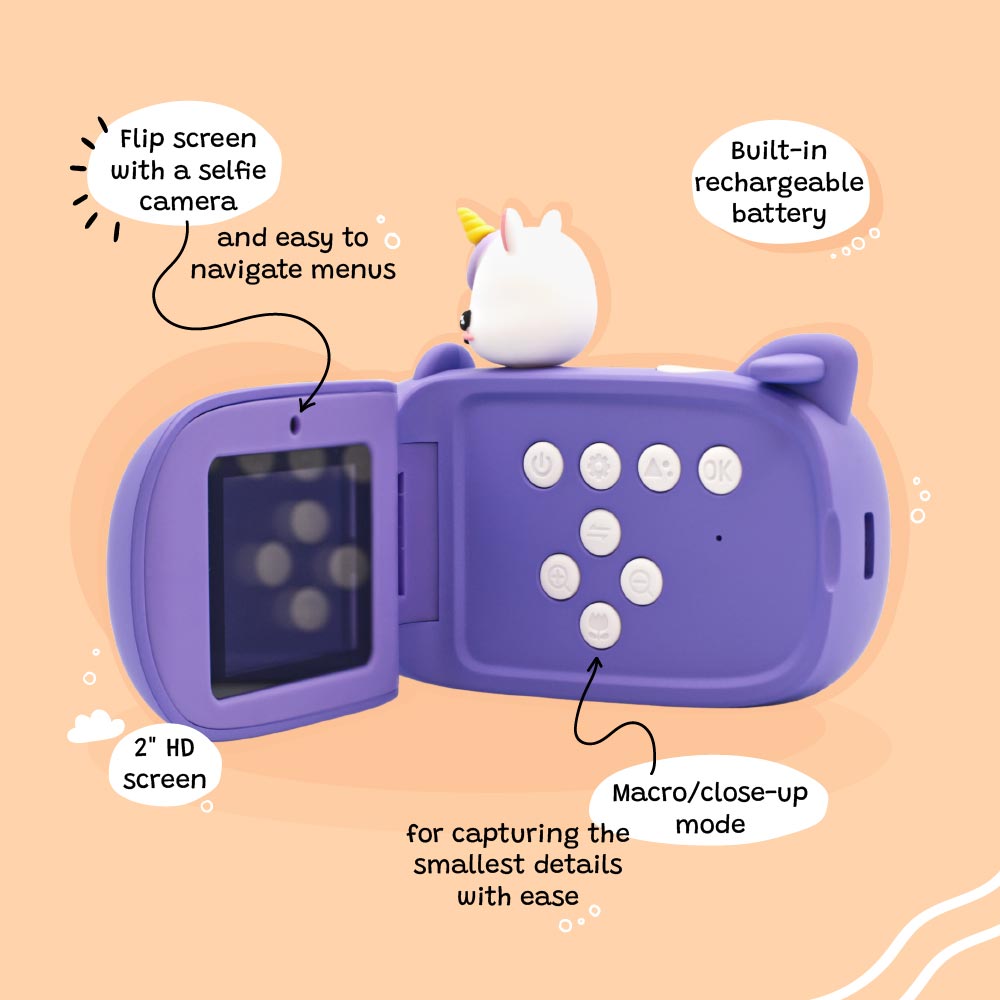 Back view of Kidamento Model V unicorn kids digital camera showing flip-out screen, control buttons, and selfie camera. Features include 2-inch HD display, macro mode, and built-in rechargeable battery.
