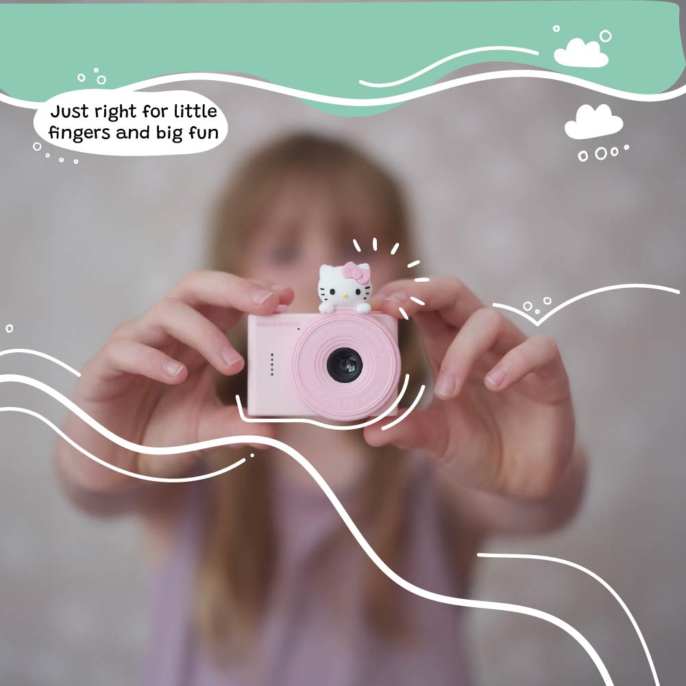 Hello Kitty Model A Kids Digital Camera - Child Holding the Camera, Perfect Size for Little Fingers and Big Fun.