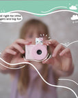 Hello Kitty Model A Kids Digital Camera - Child Holding the Camera, Perfect Size for Little Fingers and Big Fun.