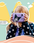 Kids digital camera Model P Kuromi Kidamento – lifestyle shot of a child’s hands holding the camera