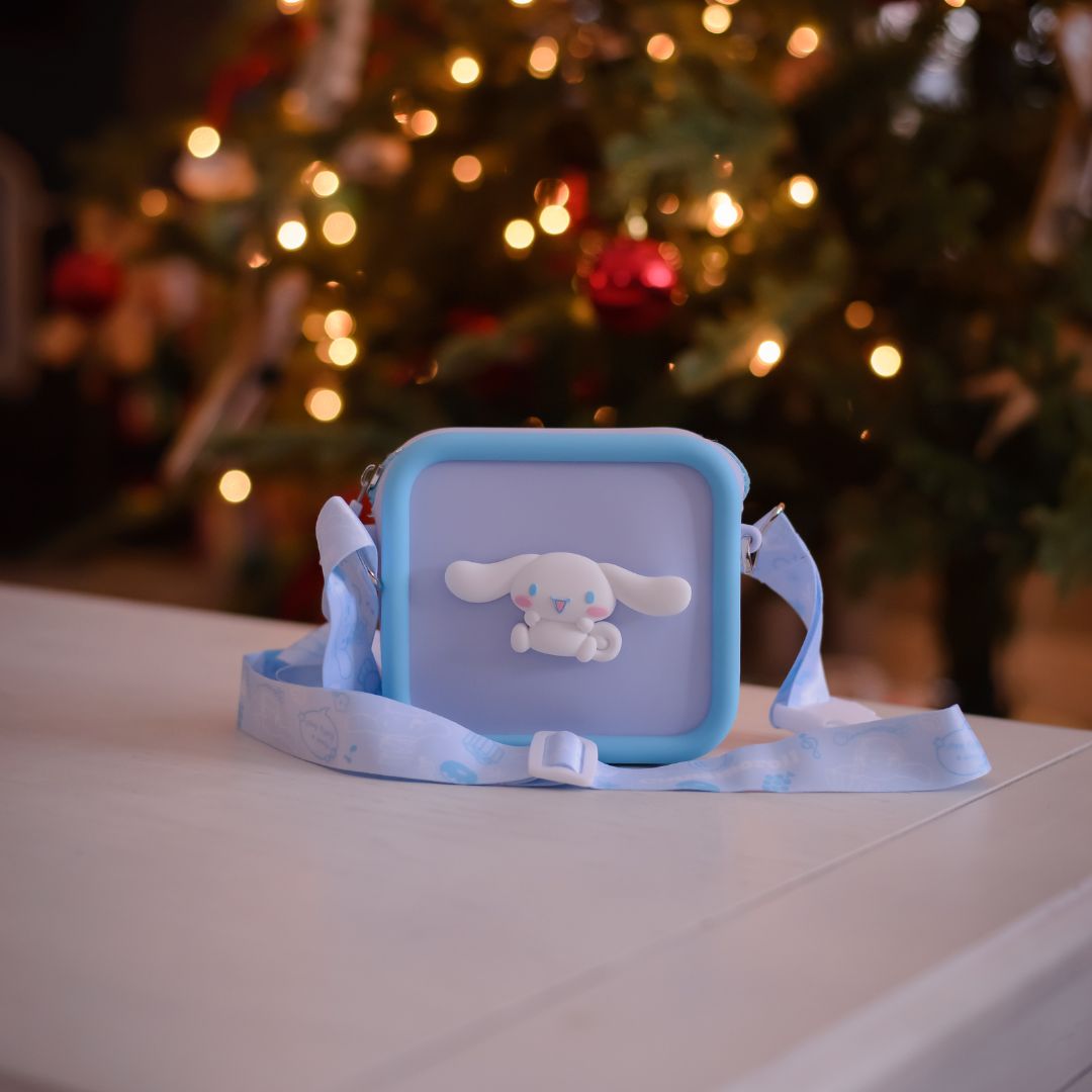 A light blue silicone Cinnamoroll bag with a white Cinnamoroll character on the front.