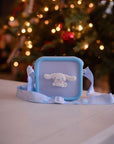 A light blue silicone Cinnamoroll bag with a white Cinnamoroll character on the front.