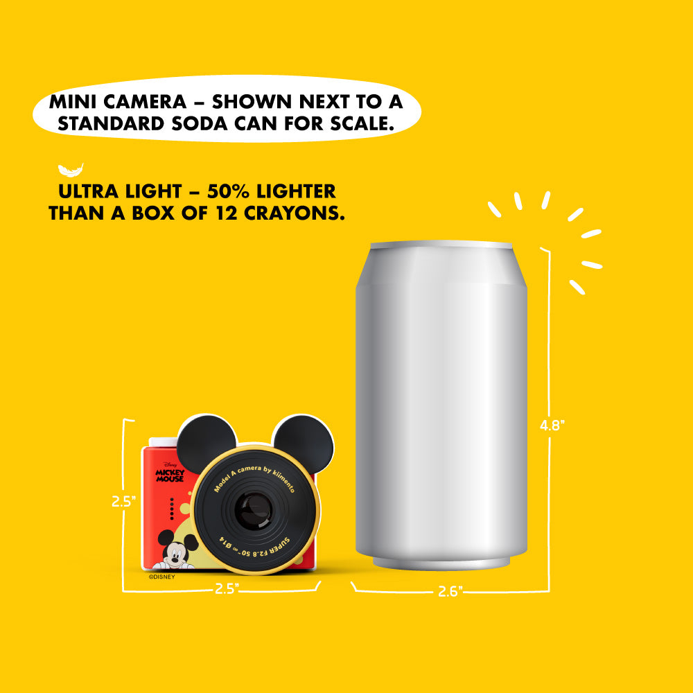 Mickey Mouse mini camera with iconic ears shown next to a soda can for size comparison.