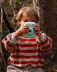Child using kiimento Mint Print Pro Camera Model P2 outdoors – mint green instant print camera