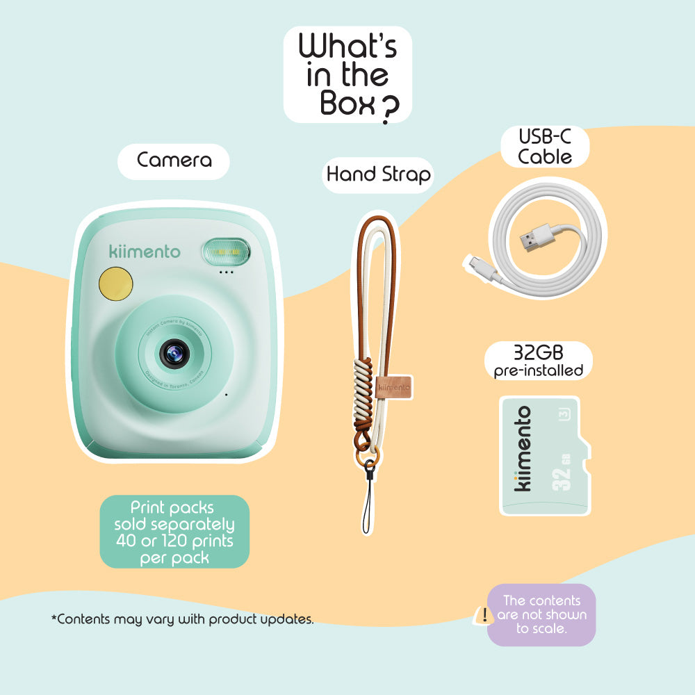 Mint Print Pro Camera with accessories including a hand strap, USB-C cable, and 32GB SD card.