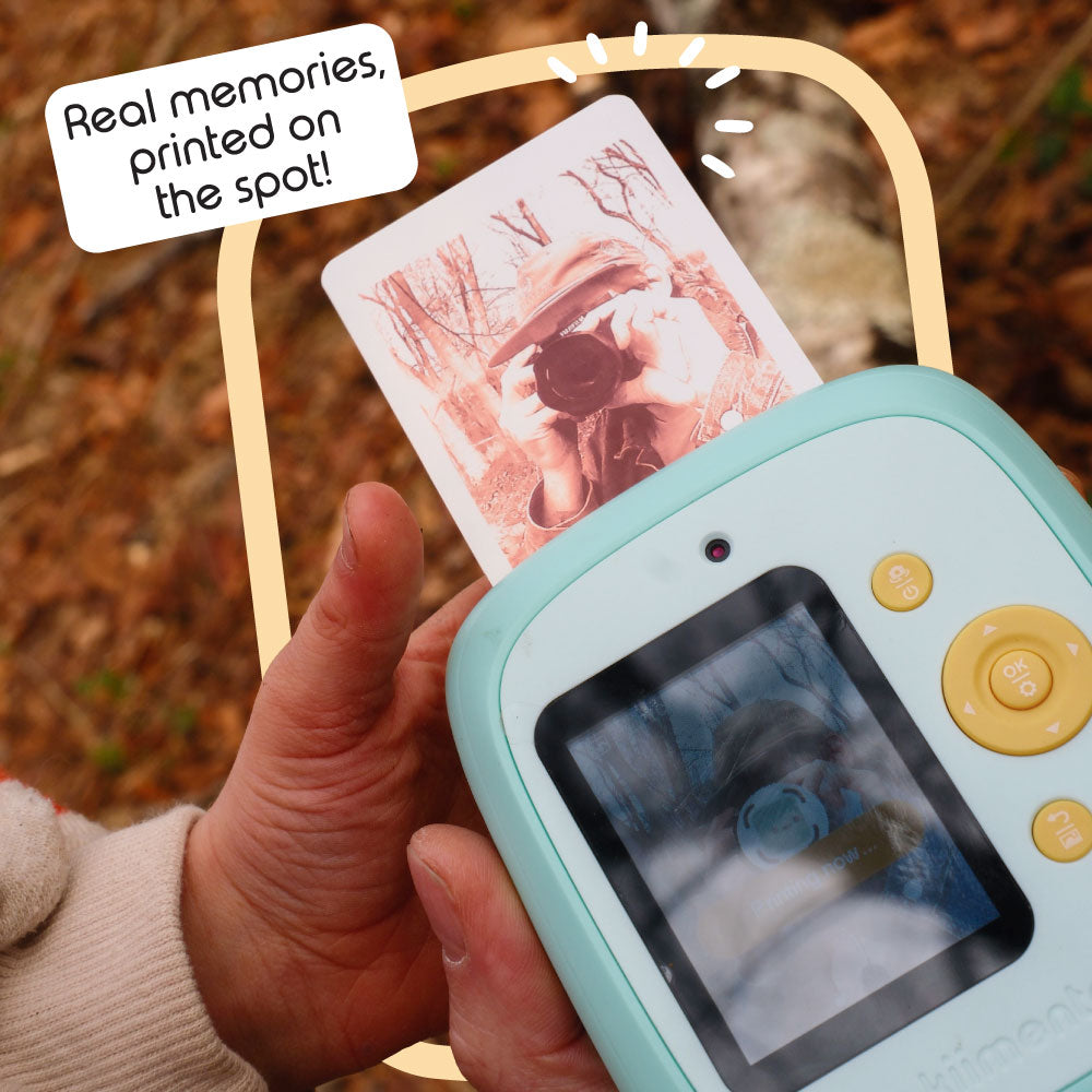 Mint Print Pro Camera printing a photo of someone taking a picture.