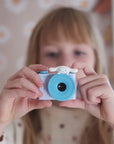 Child holding kiimento Sanrio Cinnamoroll Mini Camera Model A – blue Cinnamoroll mini kids camera