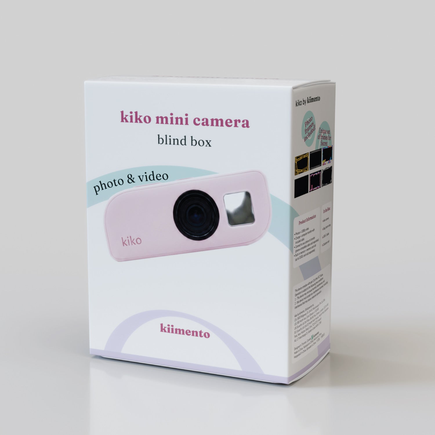 Kiko Mini Camera (non-licensed) Blind Box packaging, front-angled view, showing the pink "dawn" colorway through the window, "kiko mini camera," "blind box," and "photo & video" callouts, kiimento branding on a white box with soft pastel arc graphic.